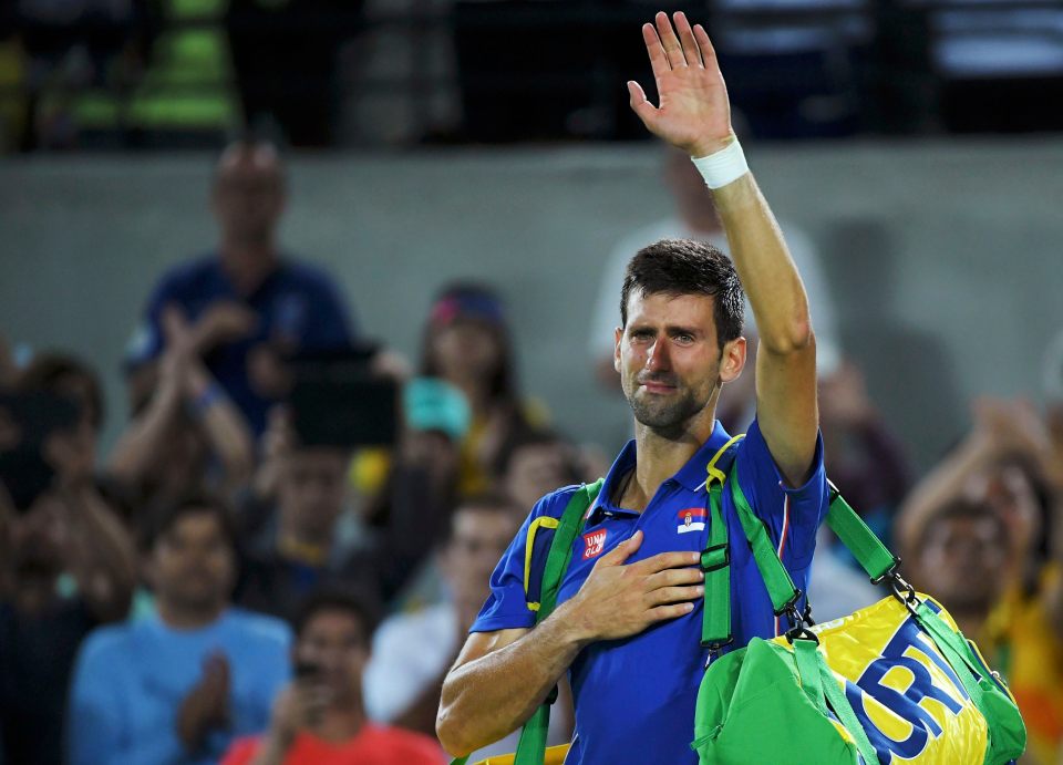 2016 Rio Olympics - Tennis - Preliminary - Men's Singles First Round - Olympic Tennis Centre - Rio de Janeiro, Brazil - 07/08/2016. Novak Djokovic (SRB) of Serbia reacts after losing his match against Juan Martin Del Potro (ARG) of Argentina. REUTERS/Toby Melville TPX IMAGES OF THE DAY. FOR EDITORIAL USE ONLY. NOT FOR SALE FOR MARKETING OR ADVERTISING CAMPAIGNS.