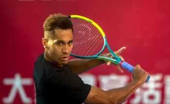 Michael Mmoh racket